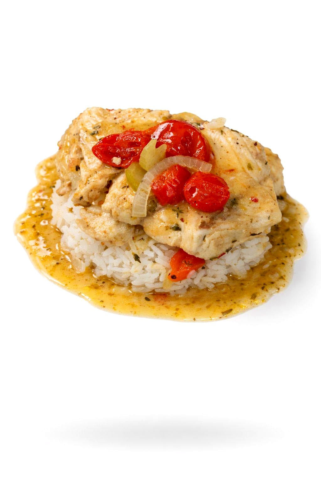 Island chicken with blistered tomatoes and peppers over steamed rice