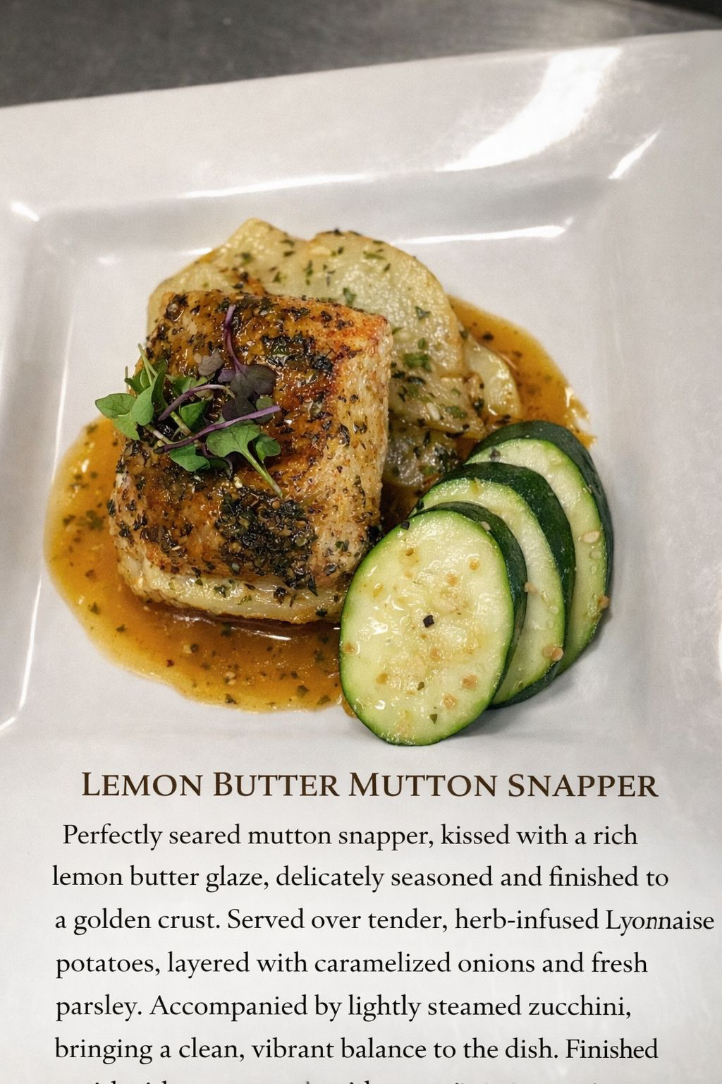 Lemon butter mutton snapper with Lyonnaise potatoes and steamed zucchini